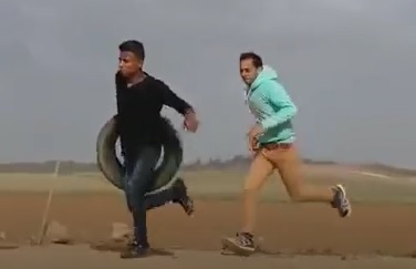 (Another and better angle) UNARMED PALESTINIAN BOY SHOT BY ISREALI SNIPER AT PROTEST IN THE GAZA STRIP