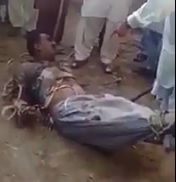 Thief caught stealing punished by the villagers .