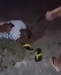 Dude Executed with Pistol Shot Next to his Yellow Flip Flops