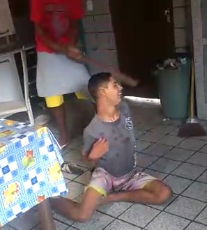 Looks Like a Mentally Challenged Kid Being Beaten by Thugs