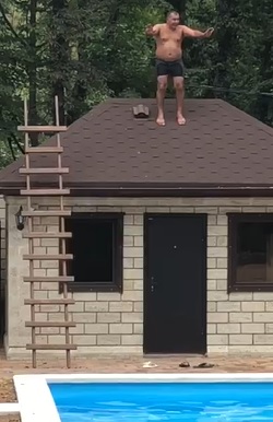 Not So Bright Guy Attempts to Jump in a Pool.