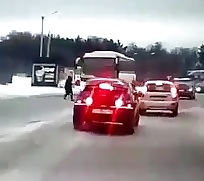 Lady Almost Dodges Bus But Not Quite