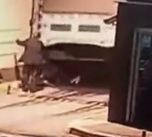 Man Flattened By Run Away Truck