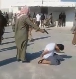 Pistol Execution of Cowering Man