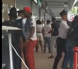 Security Guard KO's Red Hat Man