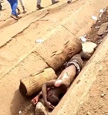 Stoned to Death in a Gutter