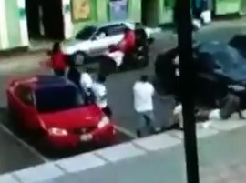 Woman Shot Dead in Driveby Shooting