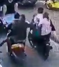 Drive-Up on Moped Land a Brutal Headshot