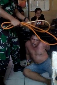 Dude Literally Torture Whooped in a Police Station