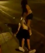 Transvestite KO's Dude Then Drags Him Off