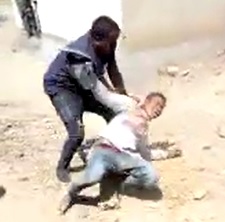 Dude Caught Stealing is Beaten and Stoned