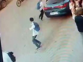 Kid Trips at the Wrong Second... With a Truck Coming