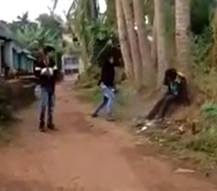 Tied to a Tree and Hit with Sticks like a Pinata 