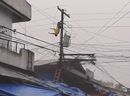 People Go About Their Days as Dude Fries 