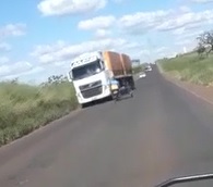 Speeding Truck Takes out Moronic Biker