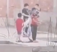 SAD: Kid Trying to Untangle his Kite From atop Building Loses his Bala