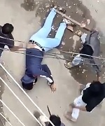 Dude Killed with a Sword on the Street.