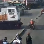 Oblivious Rider Flattened by Train (Live & Aftermath)