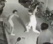 Kid Calmly Sitting on Curb Hacked Up by Rivals