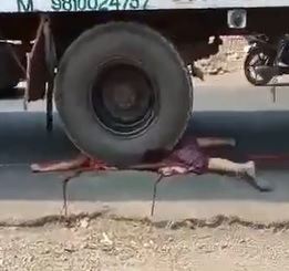 SAD: Pregnant Woman Flattened by Truck.