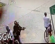 Guy with a Megaphone Gets Headshot.