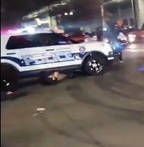 Police Plows Through Group of Protesters Crushing Some.