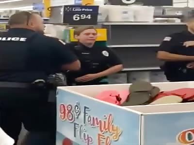 WOMAN BITES COP AT WALMART