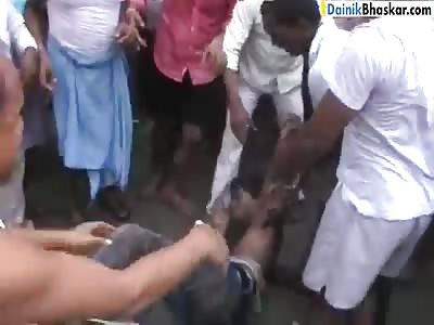 Man that tried to Molest Girl at Gunpoint Beaten by Locals, Saved by Cop