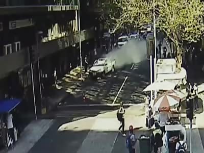 PIECE OF BUILDING FALLS ON TRUCK, CRASHES INTO STORE