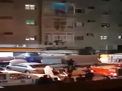 Muslim Jumps from Window