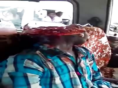 Dead Man Busted head inside his Car