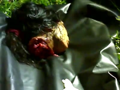 Woman beheaded and their severed feet