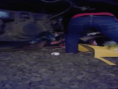 Removing the body of a suicide underneath a train