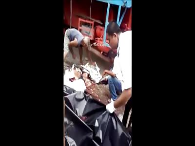 Collect Parts Of A Man Crushed By A Truck