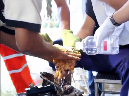 Man Holds His Hand Pressed In A Meat Grinder