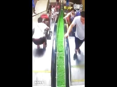 Chinese Father of the Year on the Escalator