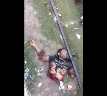 Suicide By Train: Half Guy is Still Alive Giving His Last Breaths