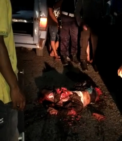 Motorcyclist Lies Shattered on The Street , Crushed by Bus