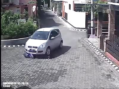 CHILD RUN OVER BY CAR WALKS AWAY