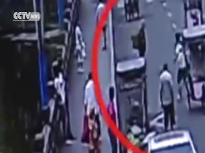 WOMAN JUMPS OFF THE BRIDGE; HUSBAND, POLICEMAN FOLLOW