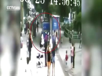 WATCH: BUSY SIDEWALK DRAMATICALLY COLLAPSES