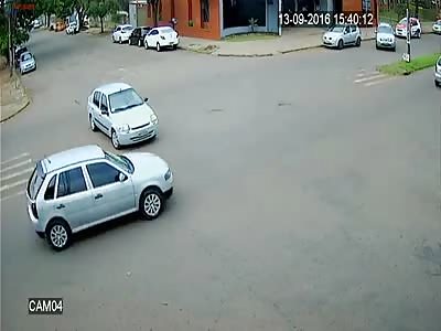 WATCH DRIVER TRIES TO FLEE AFTER CAUSING MOTORCYCLE CRASH