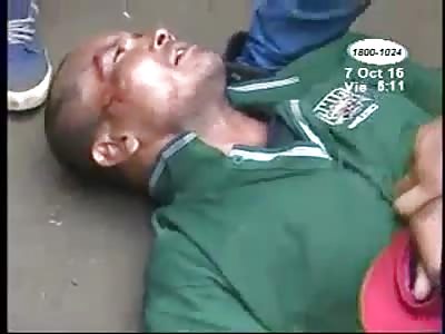 THIEF BEING BEATEN HAS TEETH RIPPED OUT BY KICKS