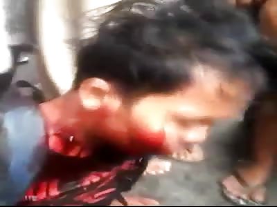 THIEF BEING BEATEN BY MOB