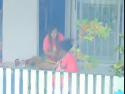 MOTHER BEATING DAUGHTER