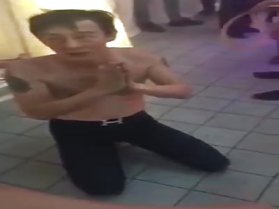 MAN BEING BRUTALLY BEATEN WITH A HOSE