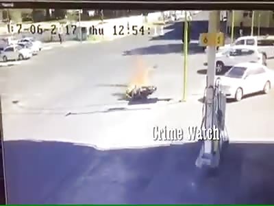 WATCH BIKER CRASH AND BIKE INSTANTLY BURST INTO FLAMES