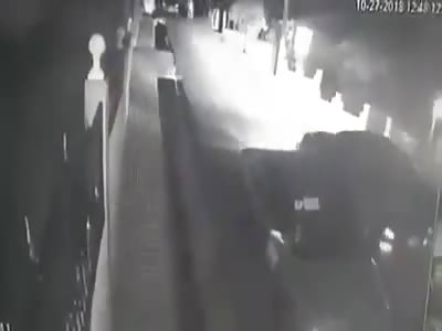 RIDER LANDS ON CAR HOOD