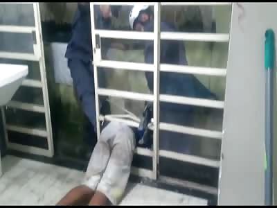 HAPLESS WOULD-BE BURGLAR HAD TO BE RESCUED BY POLICE