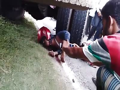 POOR GUY SMASHED BY TRUCK TIRE